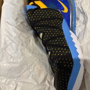Nike LeBron XVIII, Black and Blue Athletic Shoes with Yellow Highlights
